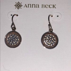 Gold and silver dangle earrings